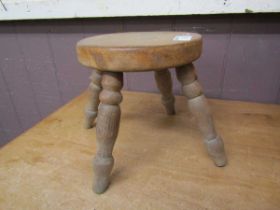 An early 20th century hand crafted circular seated child's stool