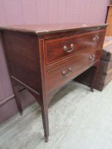 An early 20th century mahogany inlaid chest of two drawers on square tapering supports