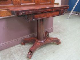 A Victorian mahogany fold over tea table