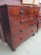 A 19th century mahogany chest of two short over three long graduating drawers