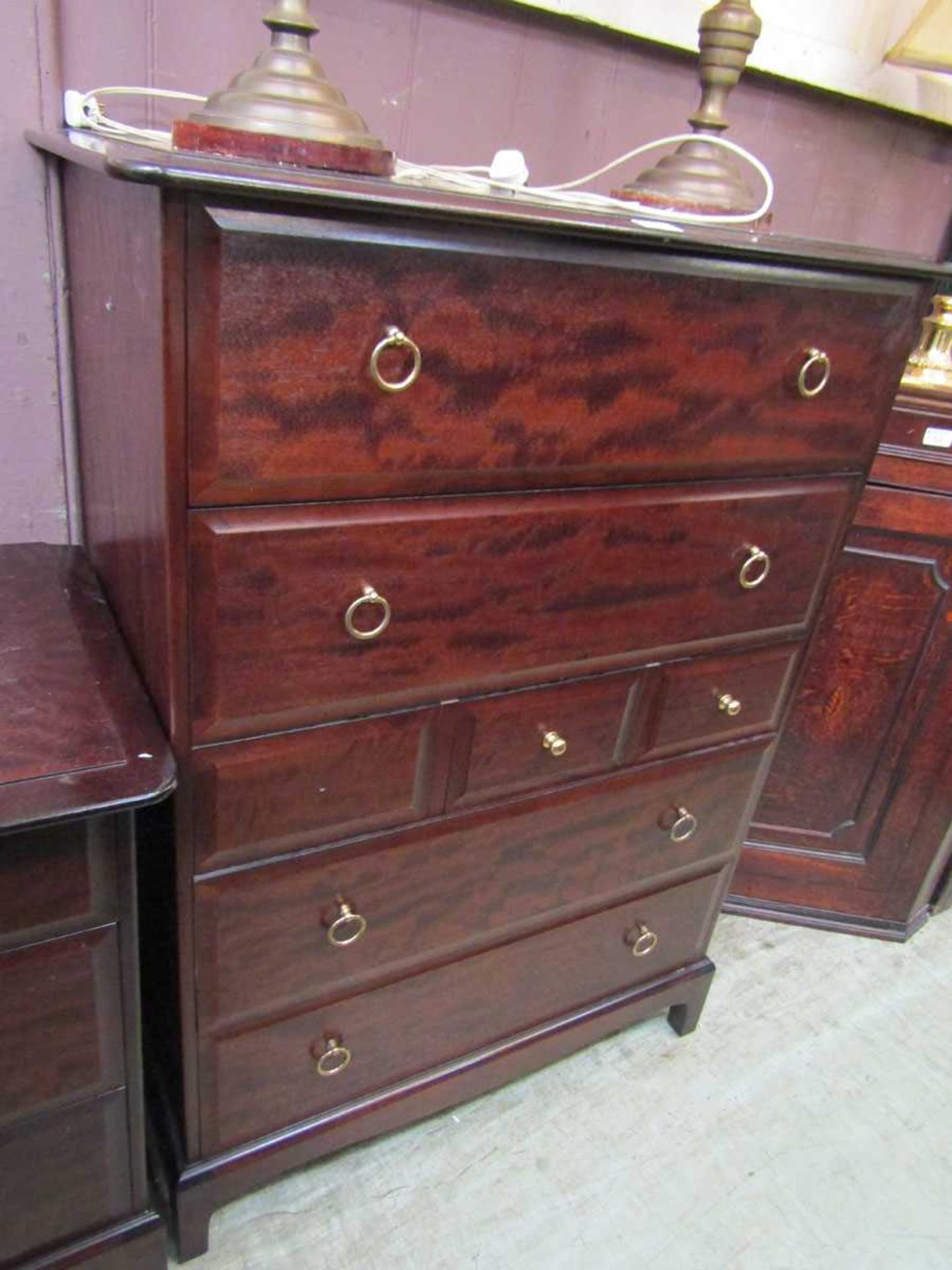 A Stag Minstrel multi drawer chest of drawers having two large drawers above three small drawers