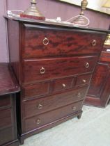 A Stag Minstrel multi drawer chest of drawers having two large drawers above three small drawers