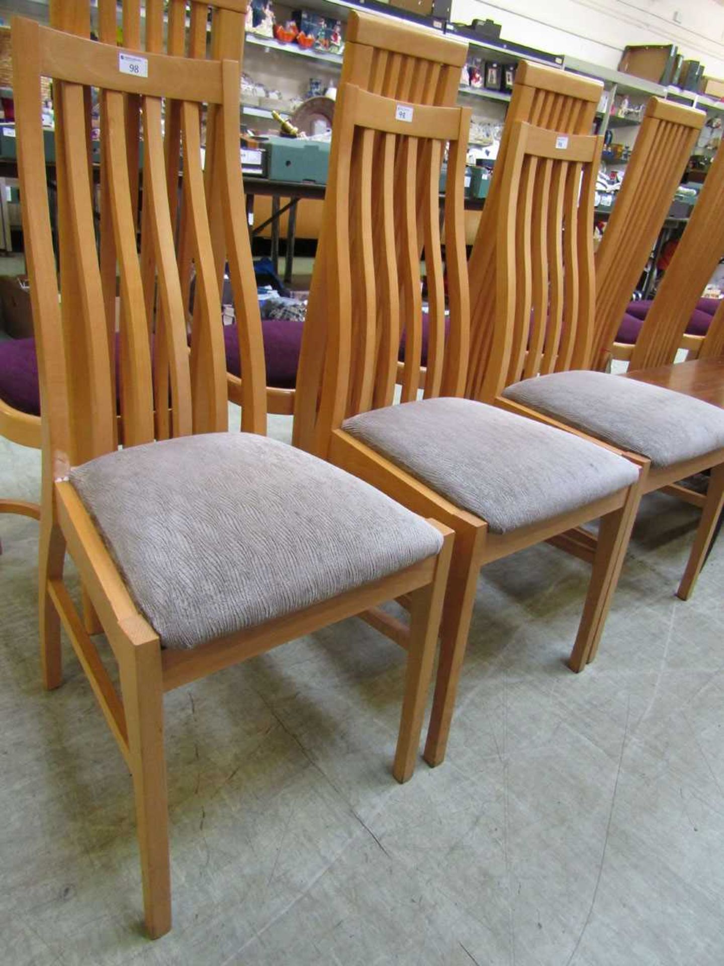 Three modern beech effect high back dining chairs