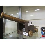 A brass desktop cannon