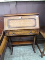 An early 20th century oak ladies' bureau with beaded decoration, 74cm wide