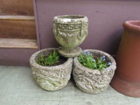 A pair and a single reconstituted stone garden planters