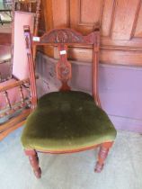 A Victorian mahogany dining chair with upholstered stuff over seat