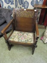 An early 20th century metamorphic oak chair