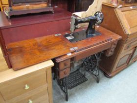 A treadle based Singer sewing machine