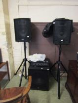 A pair of Subzero speakers on stands together with a PM42E tuner unit and a QTX monitor speaker