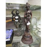 A possibly bronze figure of lady and cherub (A/F) along with a moulded figure of a lady