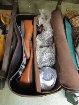 A bag containing a set of bowls and shoes