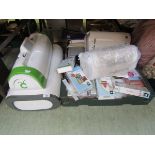 Two trays containing a large assortment of Cricut patterns and accesories, crafting materials and