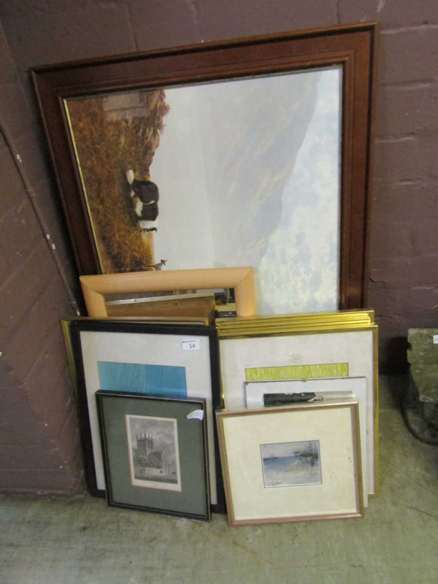 A quantity of mirrors and artworks on various subjects