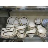 An assortment of Royal Doulton 'Harlow' (H5034) ceramic tableware to include tureens, plates,