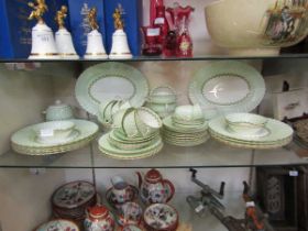 An assortment of Minton 'Cheviot' tableware to include plates, meat plates, cups, saucers, bowls,