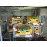 Nine boxed Corgi classic vans and coaches