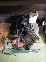 A tray containing a quantity of electric hand tools to include routers, sanders, saw, etc