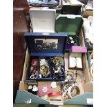 A tray containing a large quantity of costume jewellery to include beads, bangles, etc