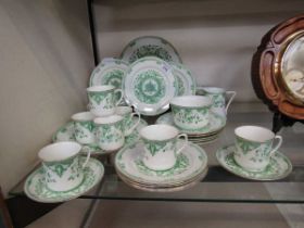 A small selection of B & Co 'Holbein' green and white ceramic tableware to include cups, saucers,