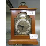 A mahogany cased mantel clock by Tempus Fugit