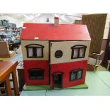 A mid-20th century painted doll's house