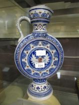 A German blue and white moon flask with floral and geometrical decoration