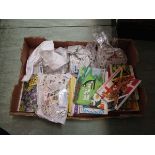 A tray containing a quantity of trade cards, some in albums