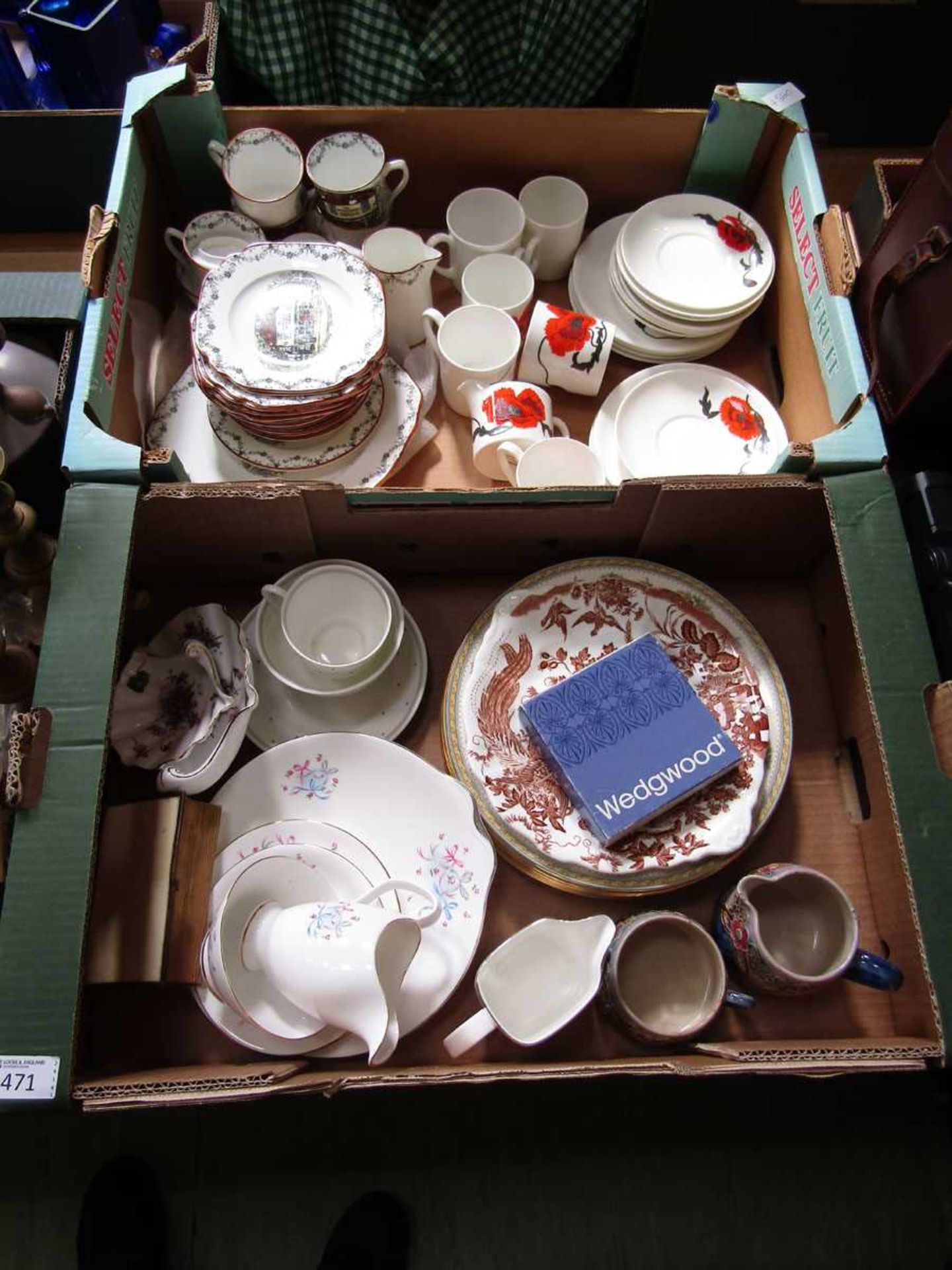 Two trays of ceramic tableware to include cups, saucers, plates, cream jug, etc