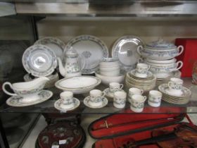 An assortment of Royal Worcester 'Mayfield' ceramic tableware with floral design to include meat