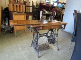 A treadle Singer sewing machine