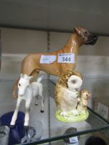 A Beswick 'CH-Ruler Of Olborough' figurine of a dog along with a Beswick Beatrix Potter's 'Old Mr