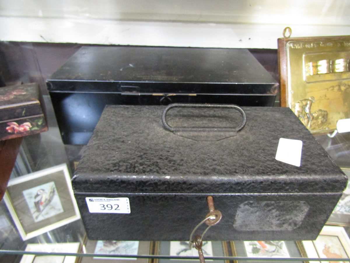 A Boots black painted tin first aid box along with one other metalwork box