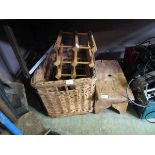 A wicker basket together with a pine wine rack and small wooden stool