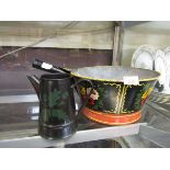 A bargeware style cooking pot together with a similar water jug