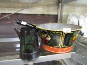 A bargeware style cooking pot together with a similar water jug