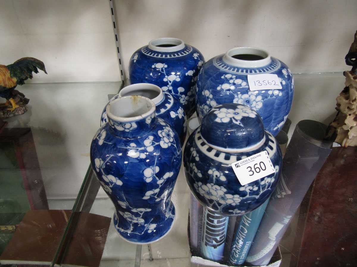 Four oriental style blue and white ginger jars (All but one missing lids) along with a similar