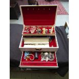 A mid-20th century jewellery box containing a quantity of costume jewellery
