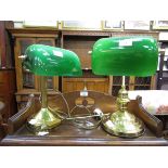 Two reproduction brass effect green glass shaded desktop lamps