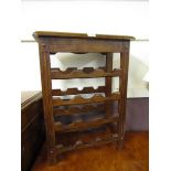 A reproduction wooden wine rack