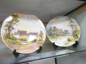 A pair of Royal Worcester plates depicting Kenilworth Castle and Warwick Castle