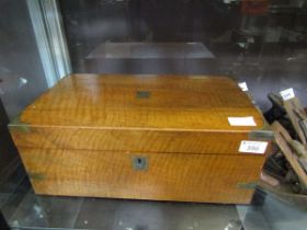 A walnut cased and brass mounted writing slope