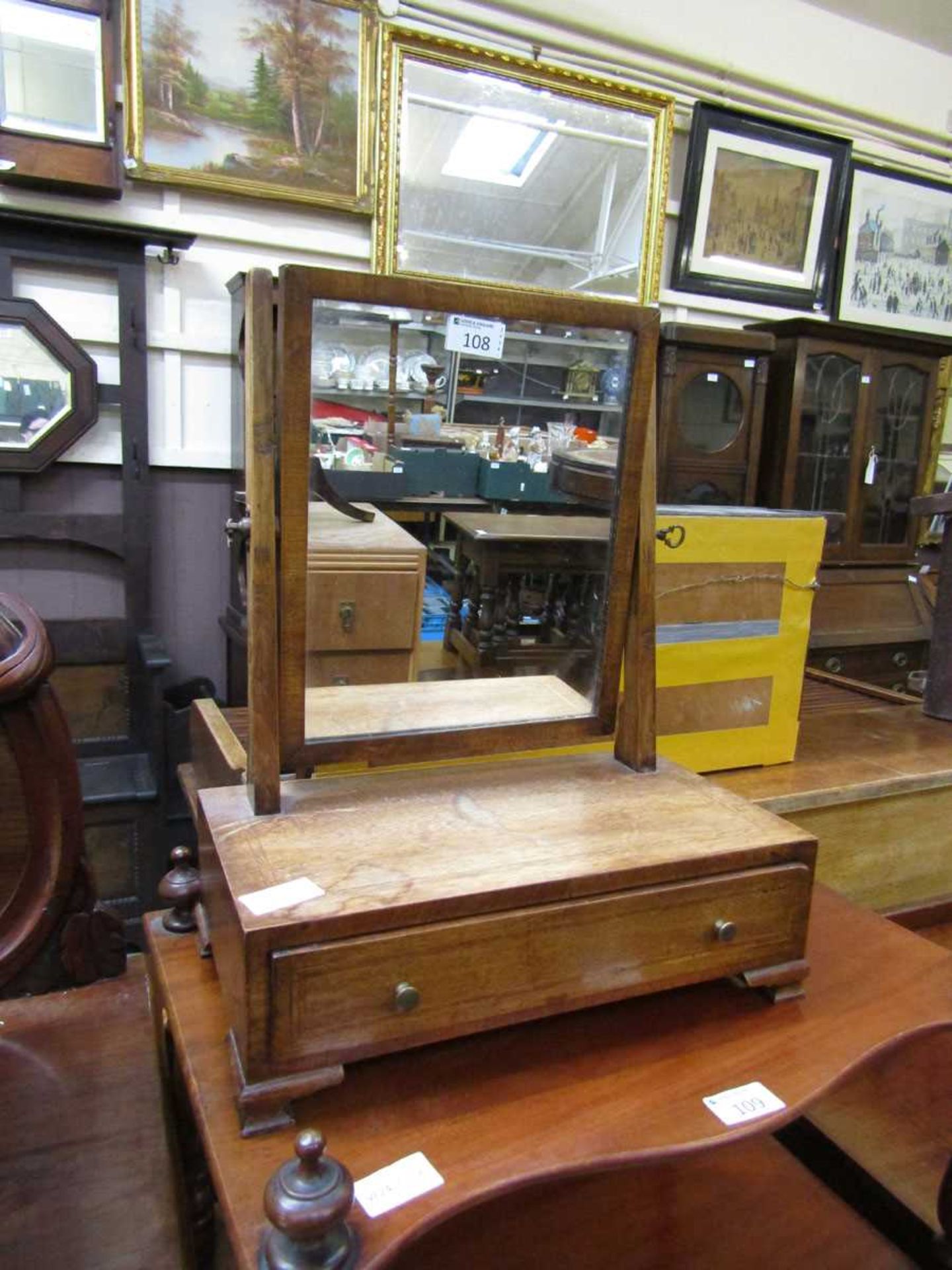 A Victorian mahogany inlaid swing toilet mirror