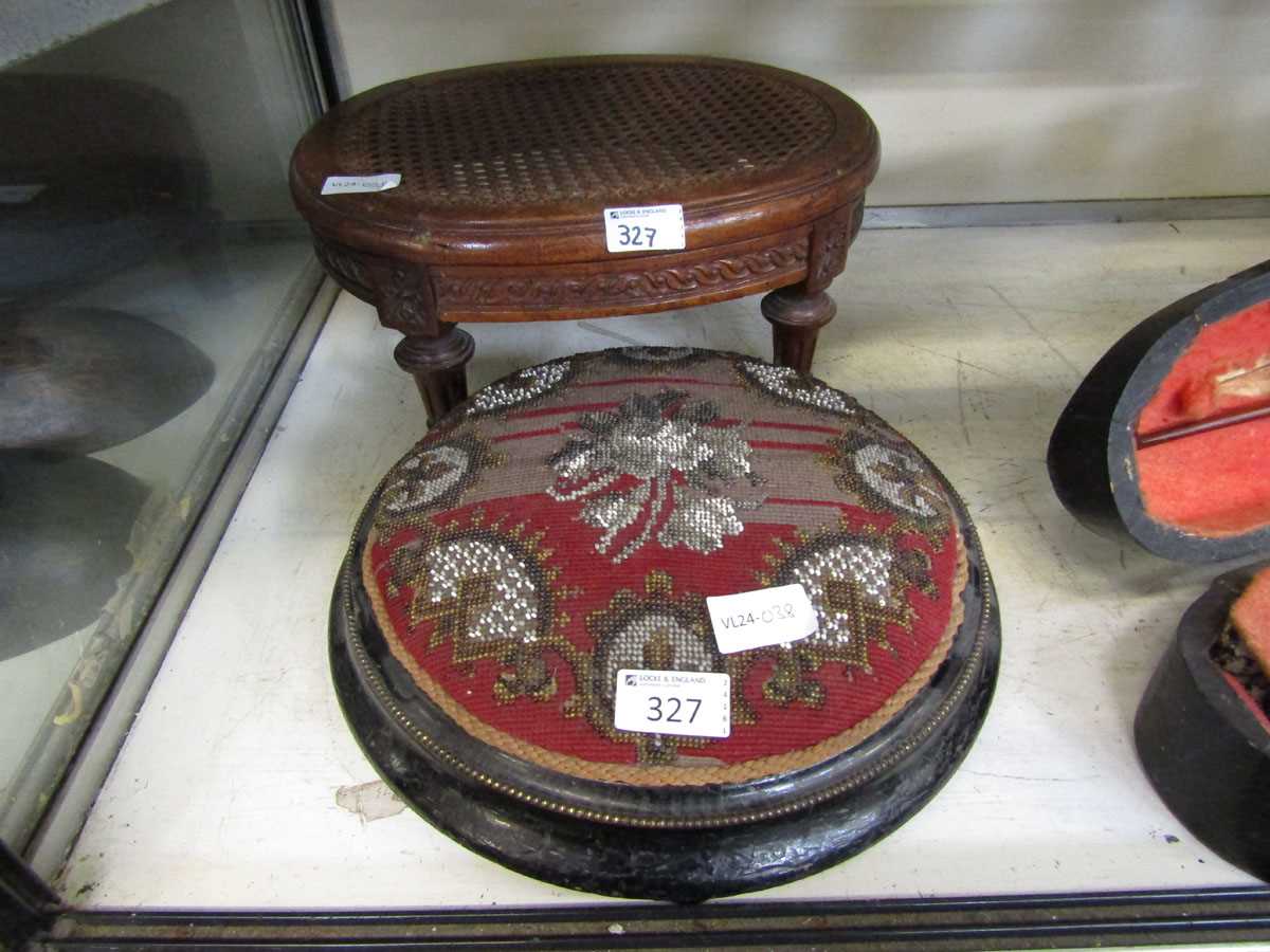 A Victorian carved mahogany and cane seated stool along with a Victorian ebonised beadwork