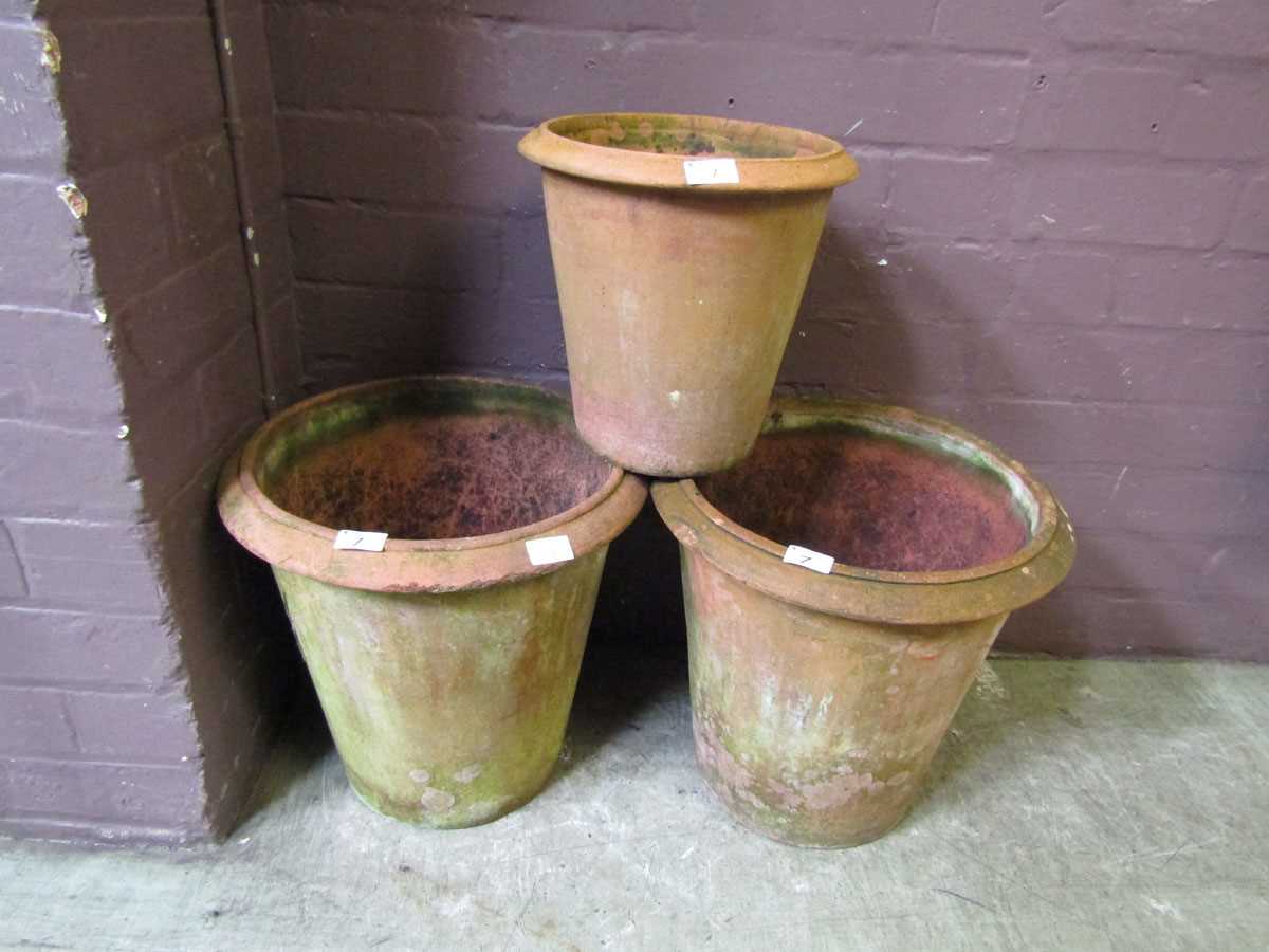 Three terracotta garden pots