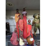 An assortment of six moulded figures of African people