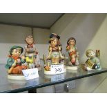 An assortment of six Goebel Hummel figurines of young children