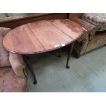 An early 20th century mahogany gate leg table