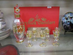 A Beykoz Camlari boxed set of six glasses and a decanter