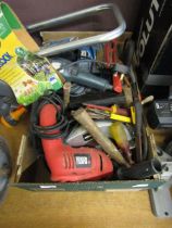 A tray containing a large quantity of hand tools to include electric saw, circular saw, sanders,